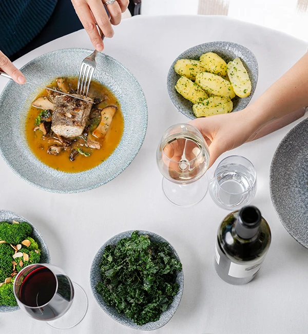 Seasonal dishes and wine served at St Moritz Hotel